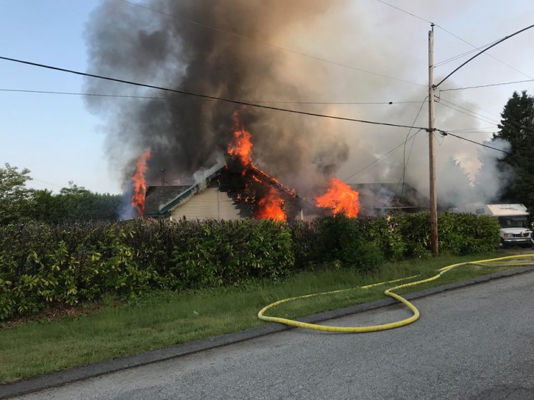 UPDATED: Home badly damaged in early morning house fire