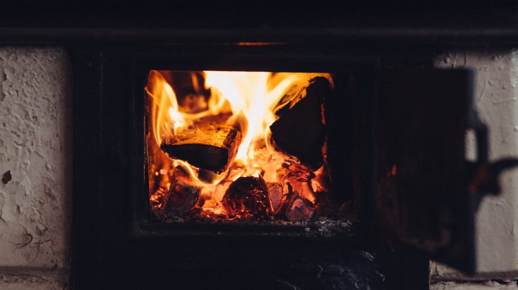 qRD to exclude fossil fuel heat sources as wood stove alternatives in rebate program